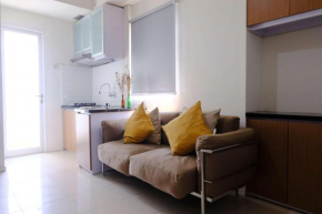 Modern Look 2BR at Apartment Parahyangan Residence By Travelio